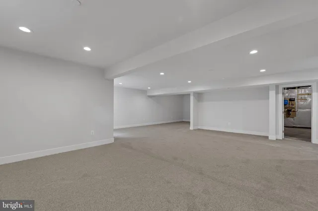 a view of a room with wooden walls