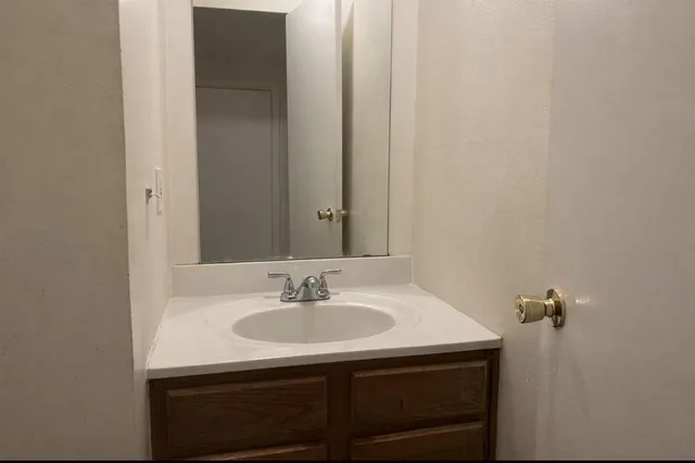a sink with a mirror