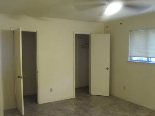 a bathroom with a double vanity sink and mirror
