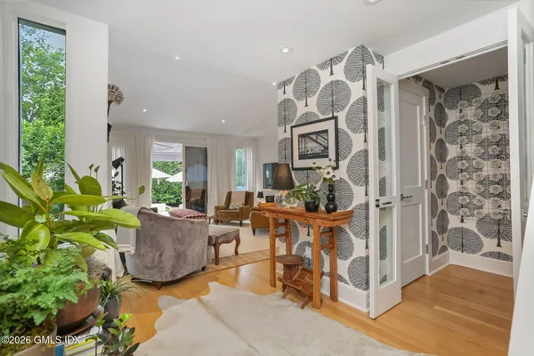 a bathroom with a bathtub and a window