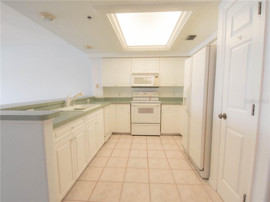 9357 Blind Pass Road, Unit 203 St. Pete Beach, FL 33706 - Photo 15 of 38 Gallery Image 15