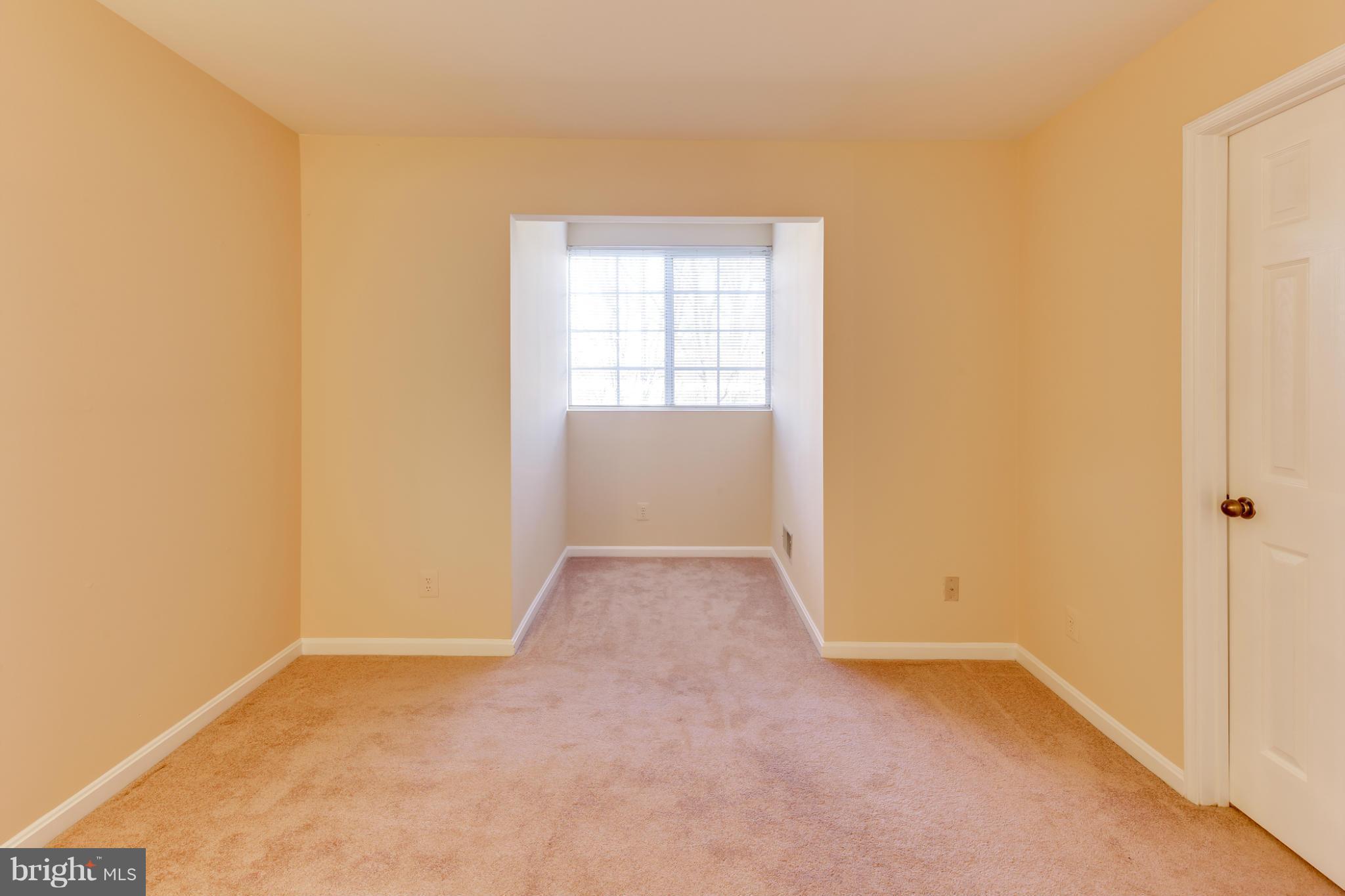 4912 Columbia Road, Unit 6111 Columbia, MD 21044 - Photo 22 of 29 an empty room with closet