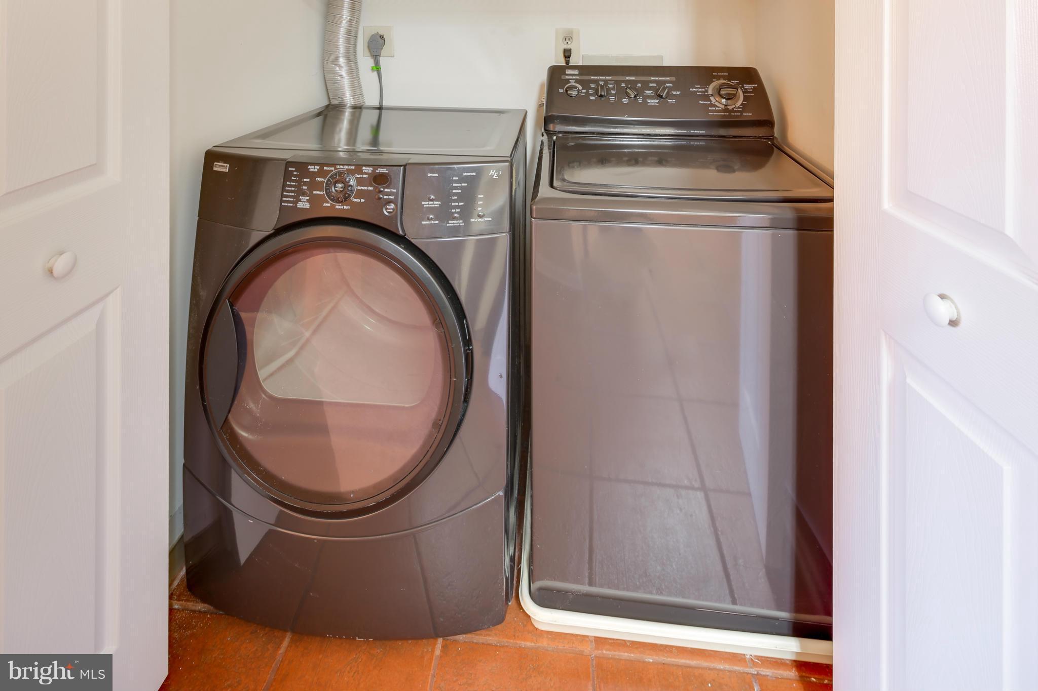 4912 Columbia Road, Unit 6111 Columbia, MD 21044 - Photo 27 of 29 a utility room with dryer and washer