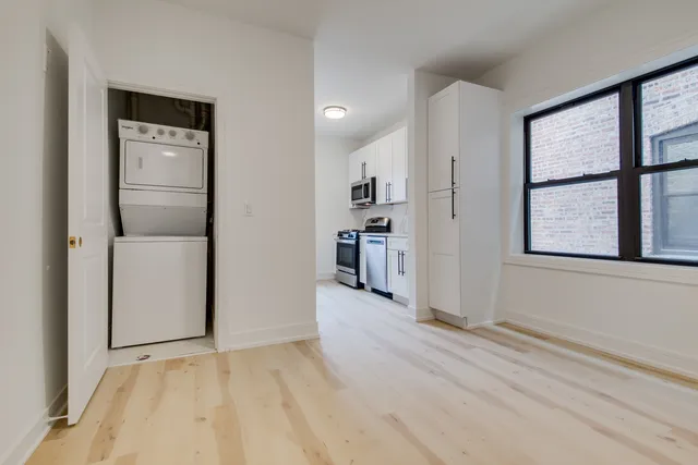 a view of livingroom with hardwood floor and hallway