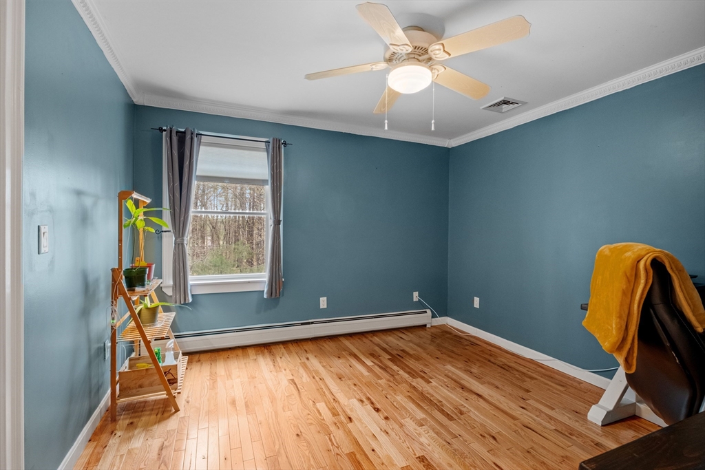 275 Lucas Road Manchester, NH 03109 - Photo 25 of 39 wooden floor and windows in a room