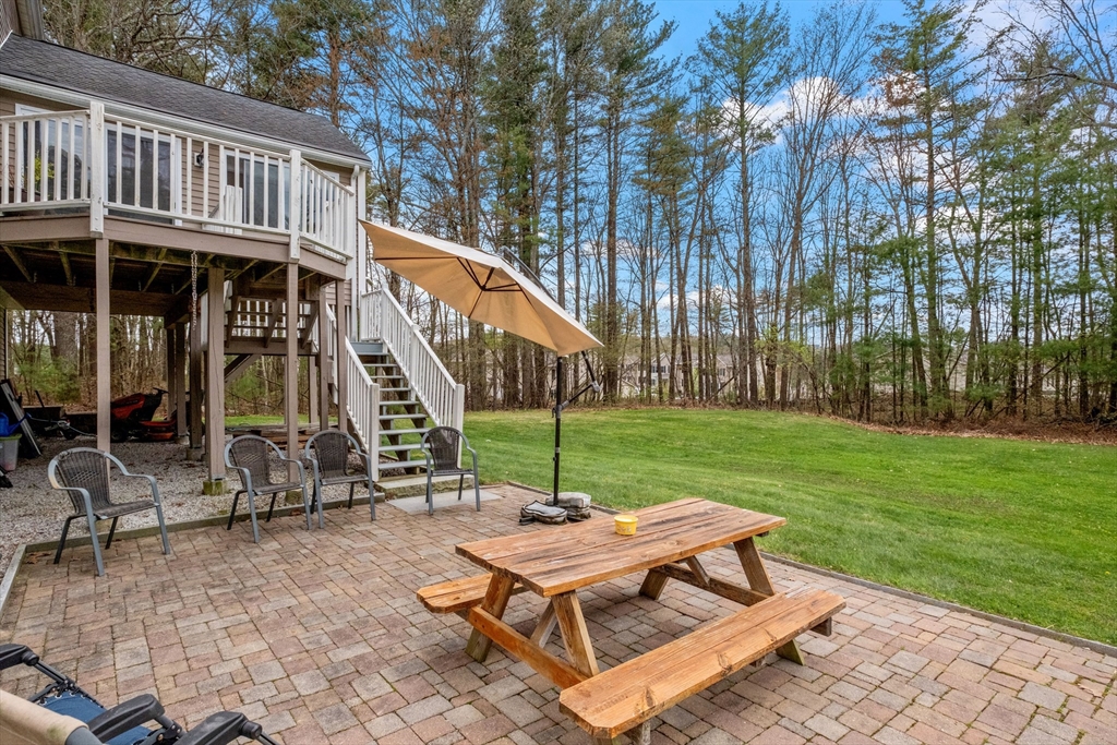 275 Lucas Road Manchester, NH 03109 - Photo 33 of 39 a view of a patio with a yard