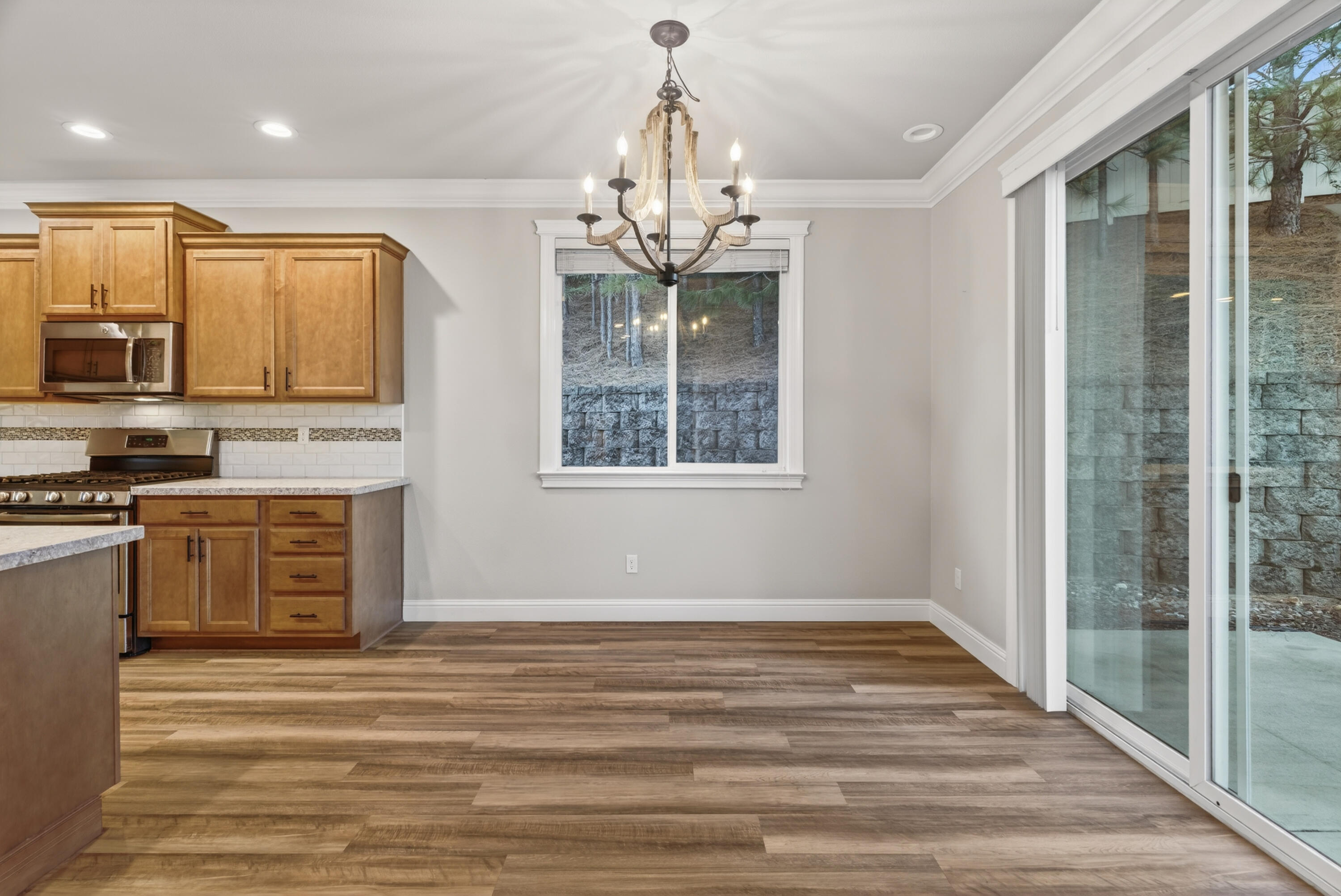 4585 Risstay Way Shasta Lake, CA 96019 - Photo 16 of 36 a view of an empty room with kitchen and window