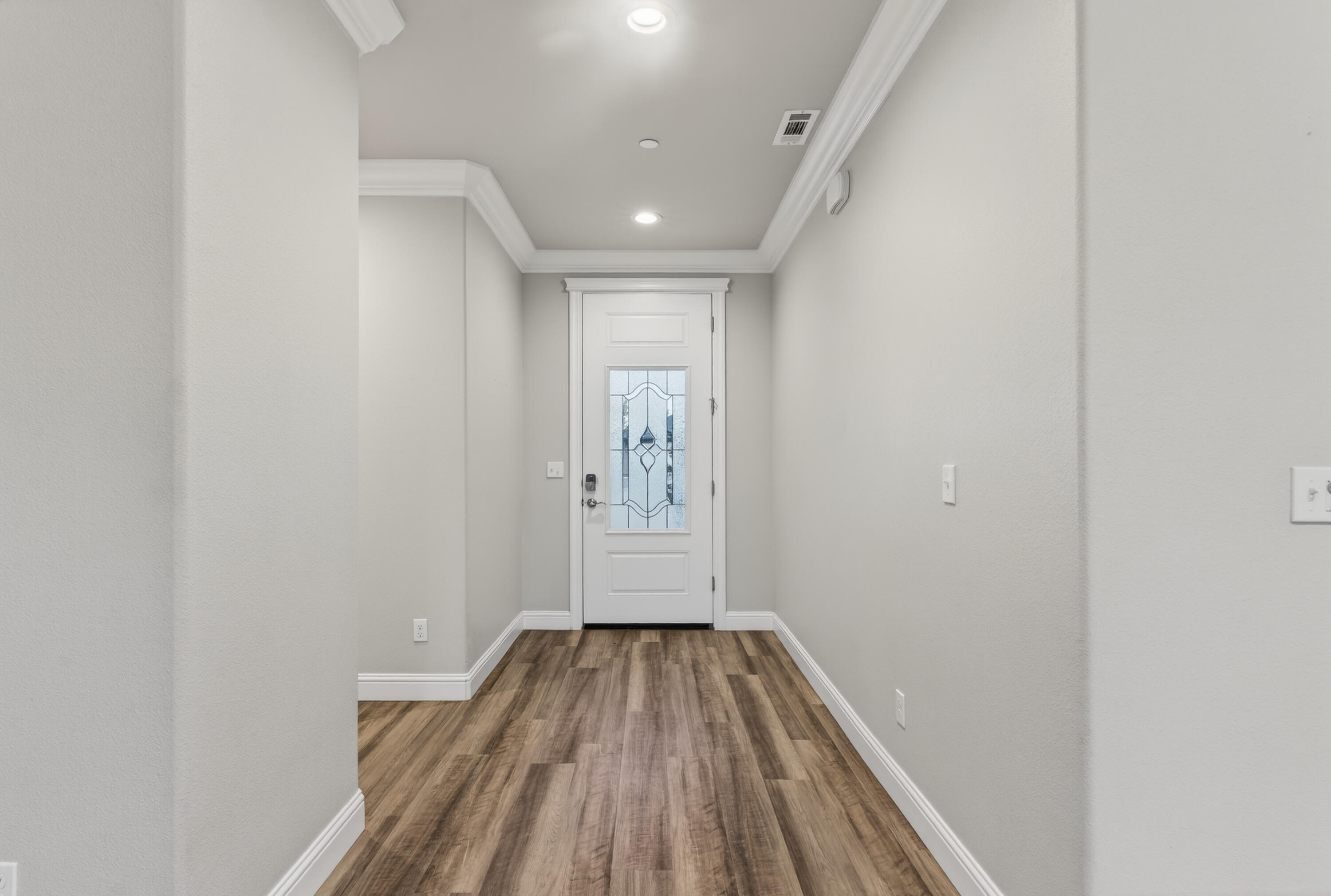 4585 Risstay Way Shasta Lake, CA 96019 - Photo 4 of 36 a view of a hallway with wooden floor