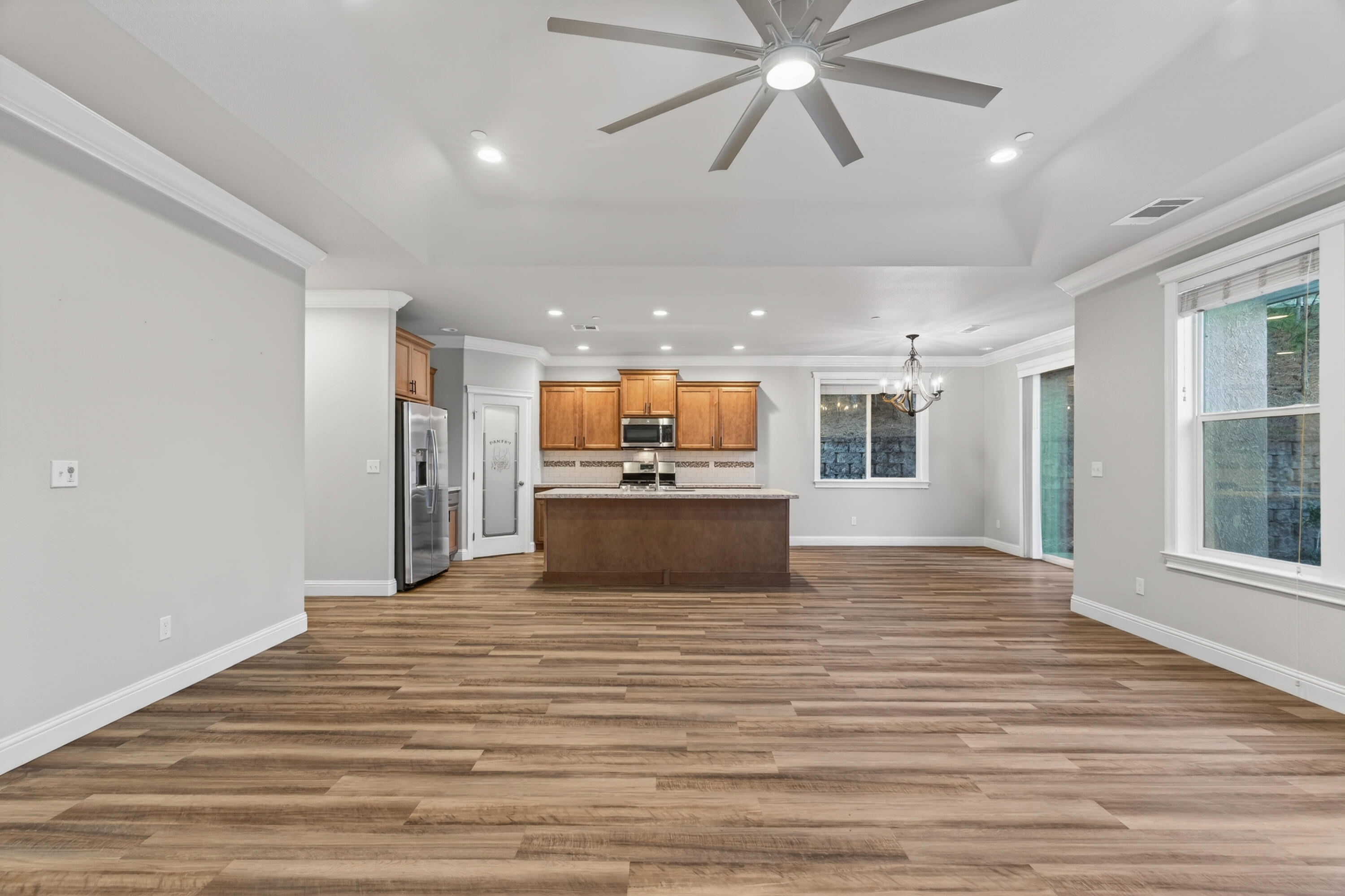 4585 Risstay Way Shasta Lake, CA 96019 - Photo 7 of 36 a view of kitchen and kitchen with microwave