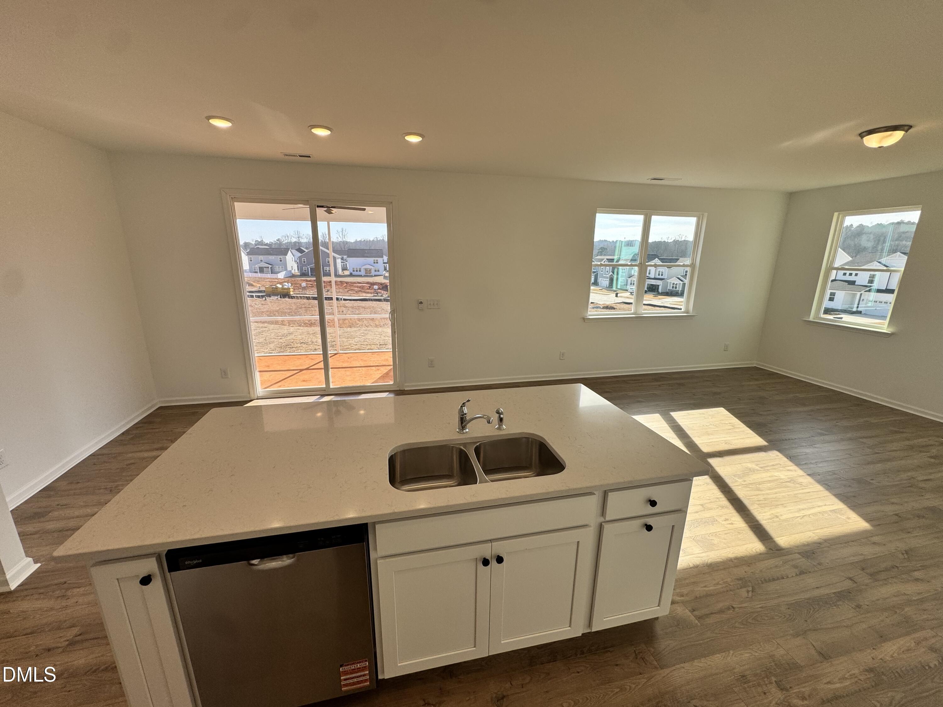 151 Sprenger Street Garner, NC 27529 - Photo 3 of 22 a kitchen with a sink and a window