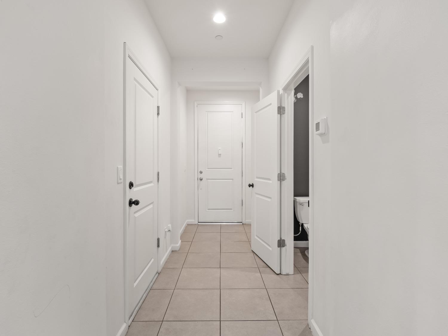 867 Fir Street Madera, CA 93636 - Photo 14 of 39 a bathroom with a shower and a sink