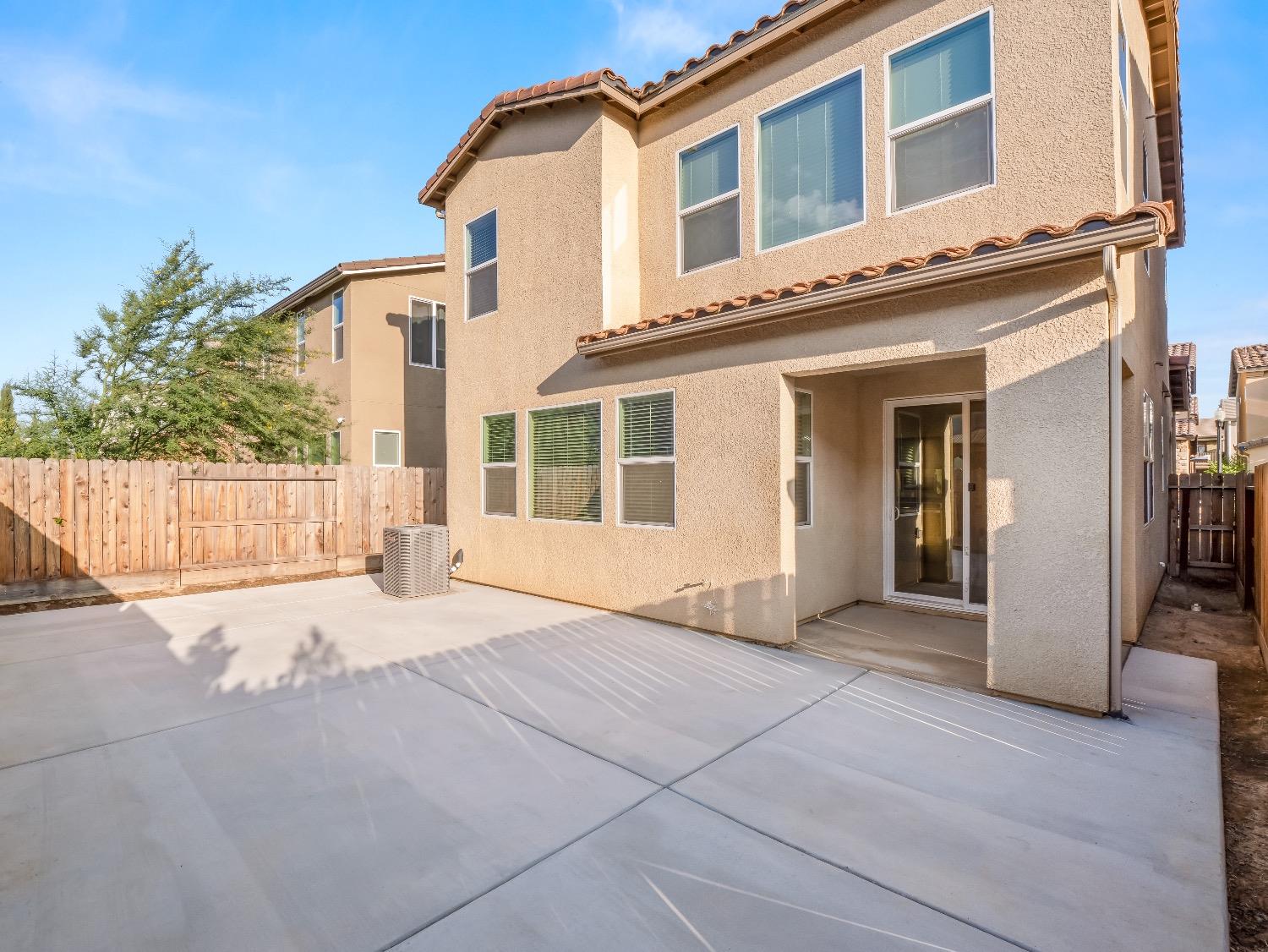 867 Fir Street Madera, CA 93636 - Photo 32 of 39 a view of a building with a outdoor space