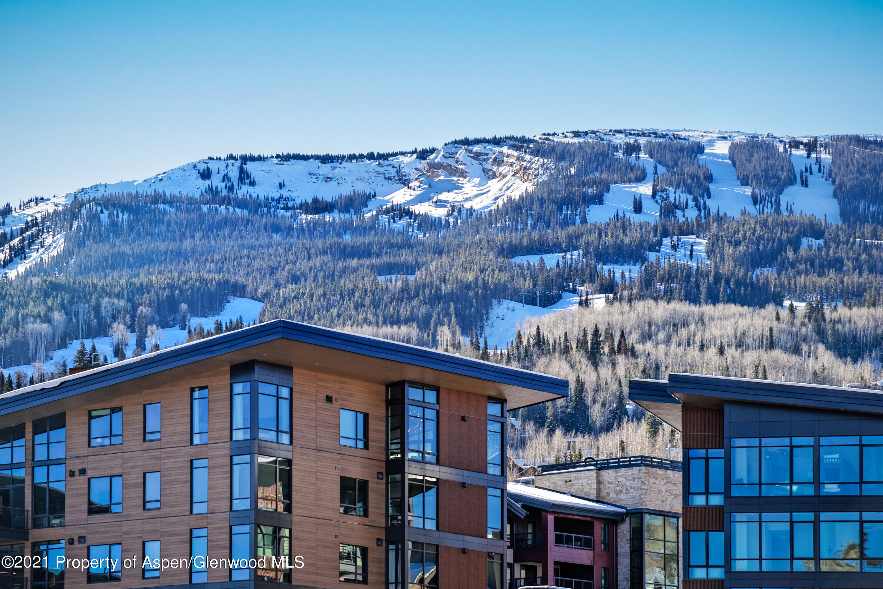 77 Wood Road, Unit 801E Snowmass Village, CO 81615 - Photo 26 of 30 a front view of a house