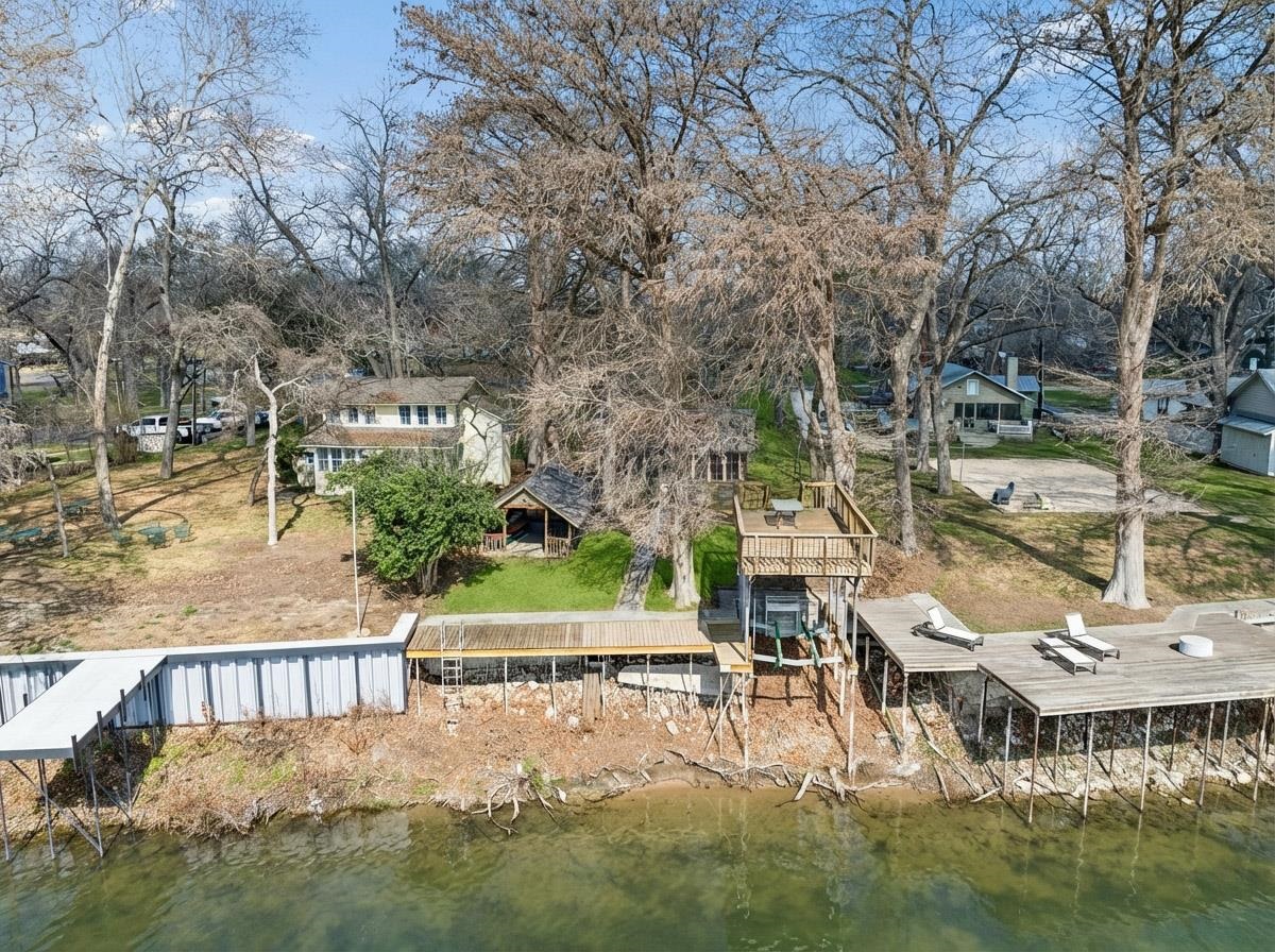 1307 Terminal Loop Road McQueeney, TX 78123 - Photo 20 of 23 a view of a house with backyard and sitting area