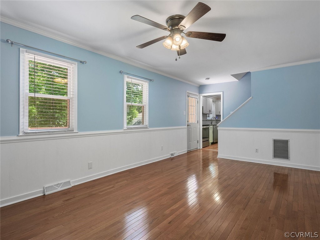 441 Walton Park Road Midlothian, VA 23114 - Photo 8 of 31 a view of an empty room with wooden floor and a window
