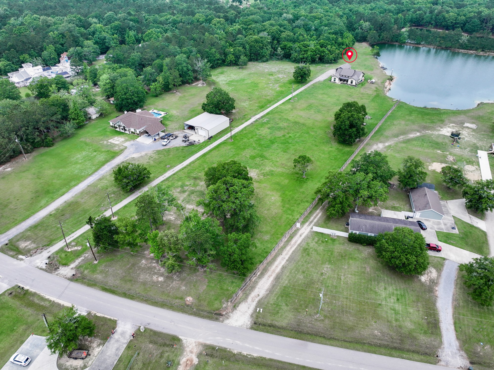 10573 Cooks Lake Road Lumberton, TX 77657 - Photo 44 of 47 a view of a garden with a lake