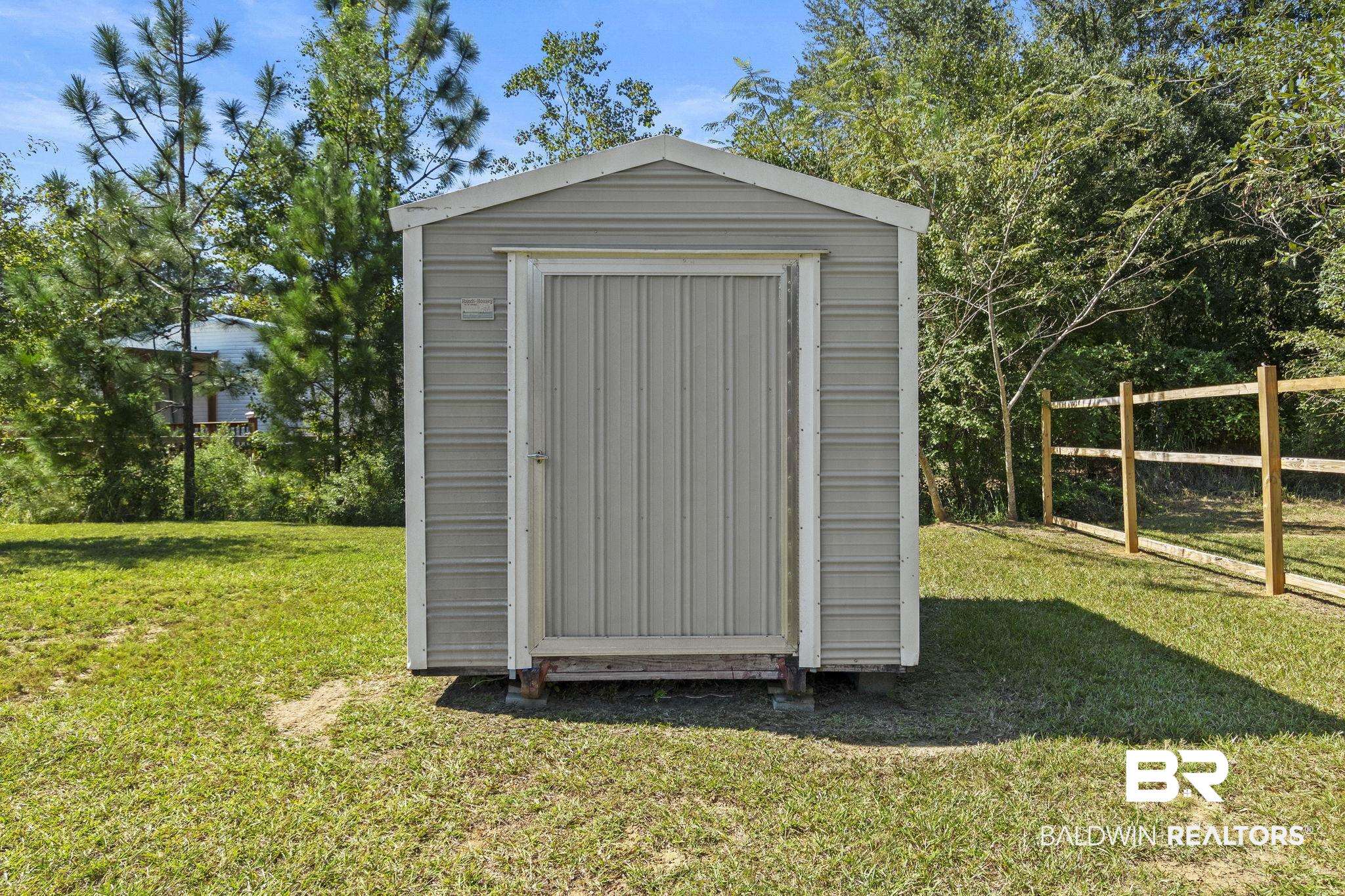 6870 Cecilia Court Theodore, AL 36582 - Photo 56 of 83 View of outdoor structure with a lawn