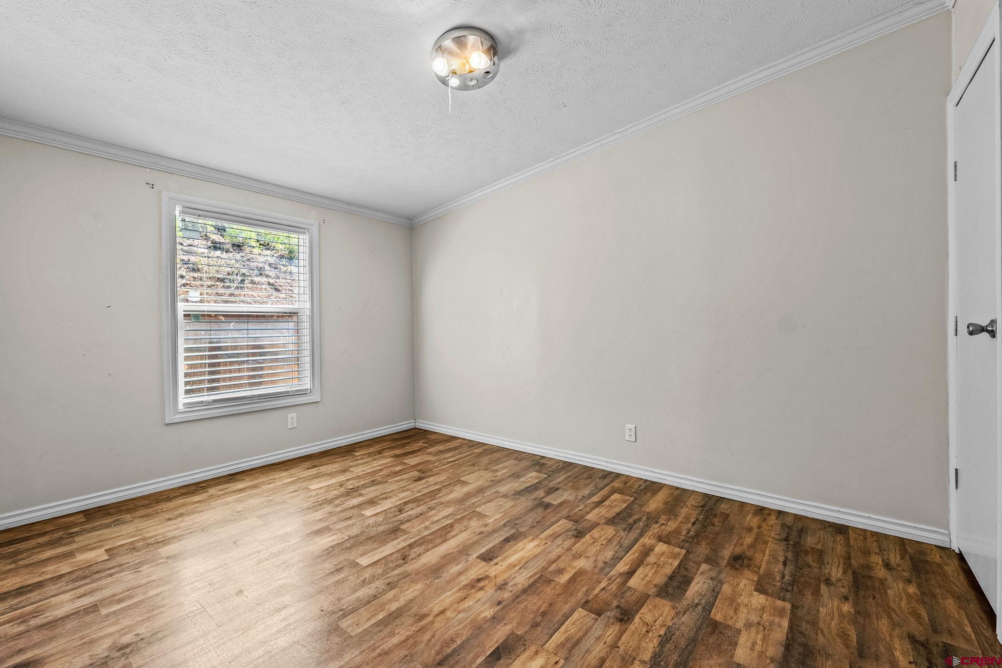 1969 County Road 142 Durango, CO 81303 - Photo 21 of 30 a view of an empty room with a window