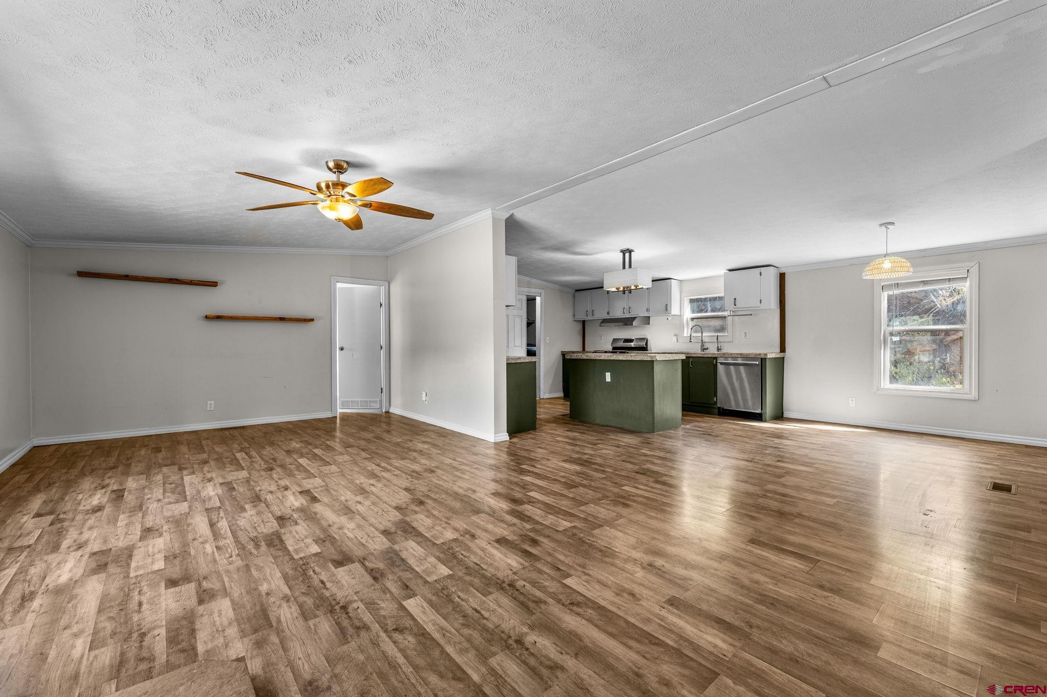 1969 County Road 142 Durango, CO 81303 - Photo 6 of 30 a view of a kitchen with a sink and a refrigerator