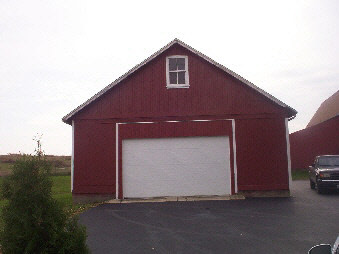 7427 East Maize Road Ridott, IL 61067 - Photo 4 of 5 a front view of a house with a yard