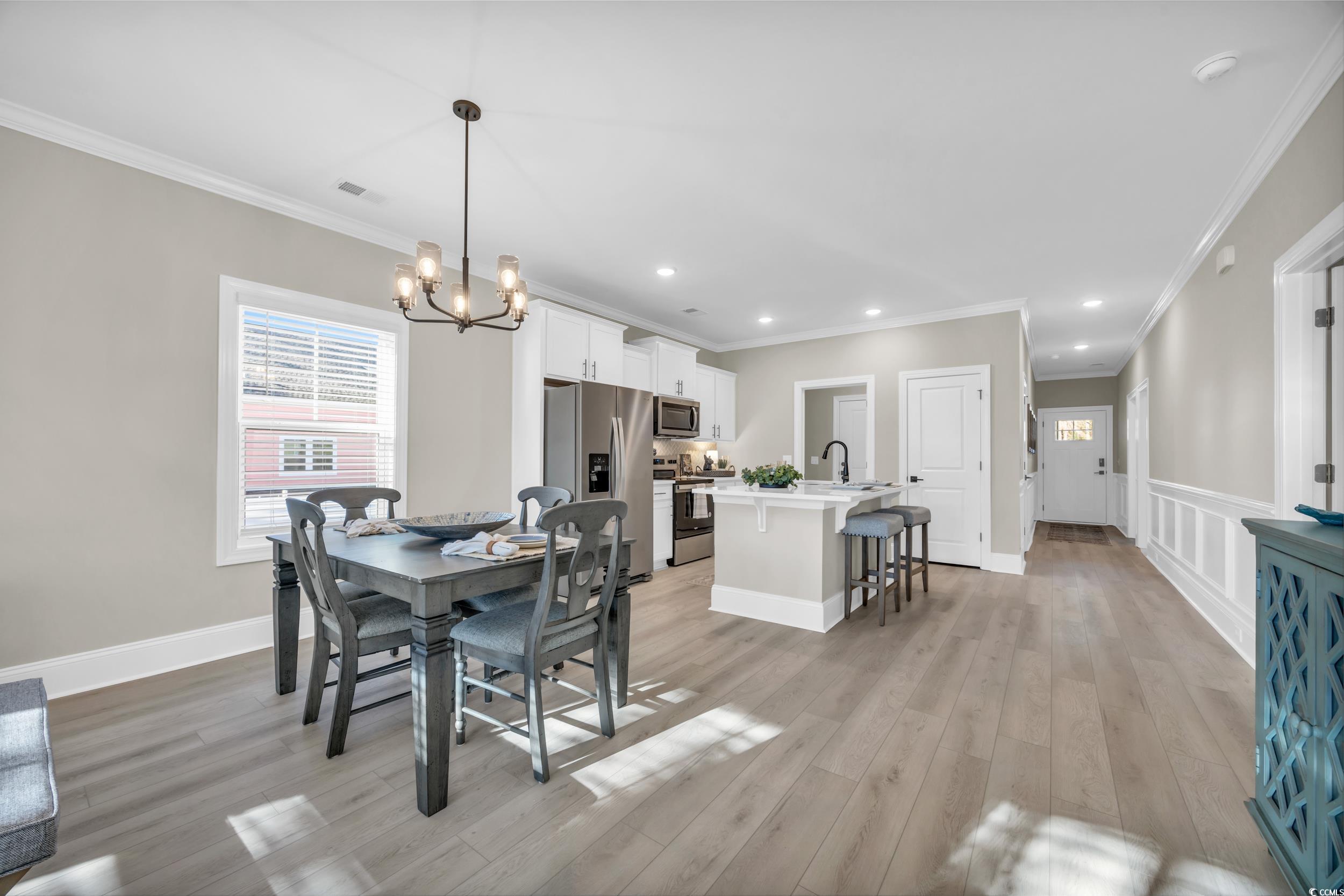 3123 Tiger Tail Road Conway, SC 29526 - Photo 13 of 38 Hall with ornamental molding and dark hardwood / w