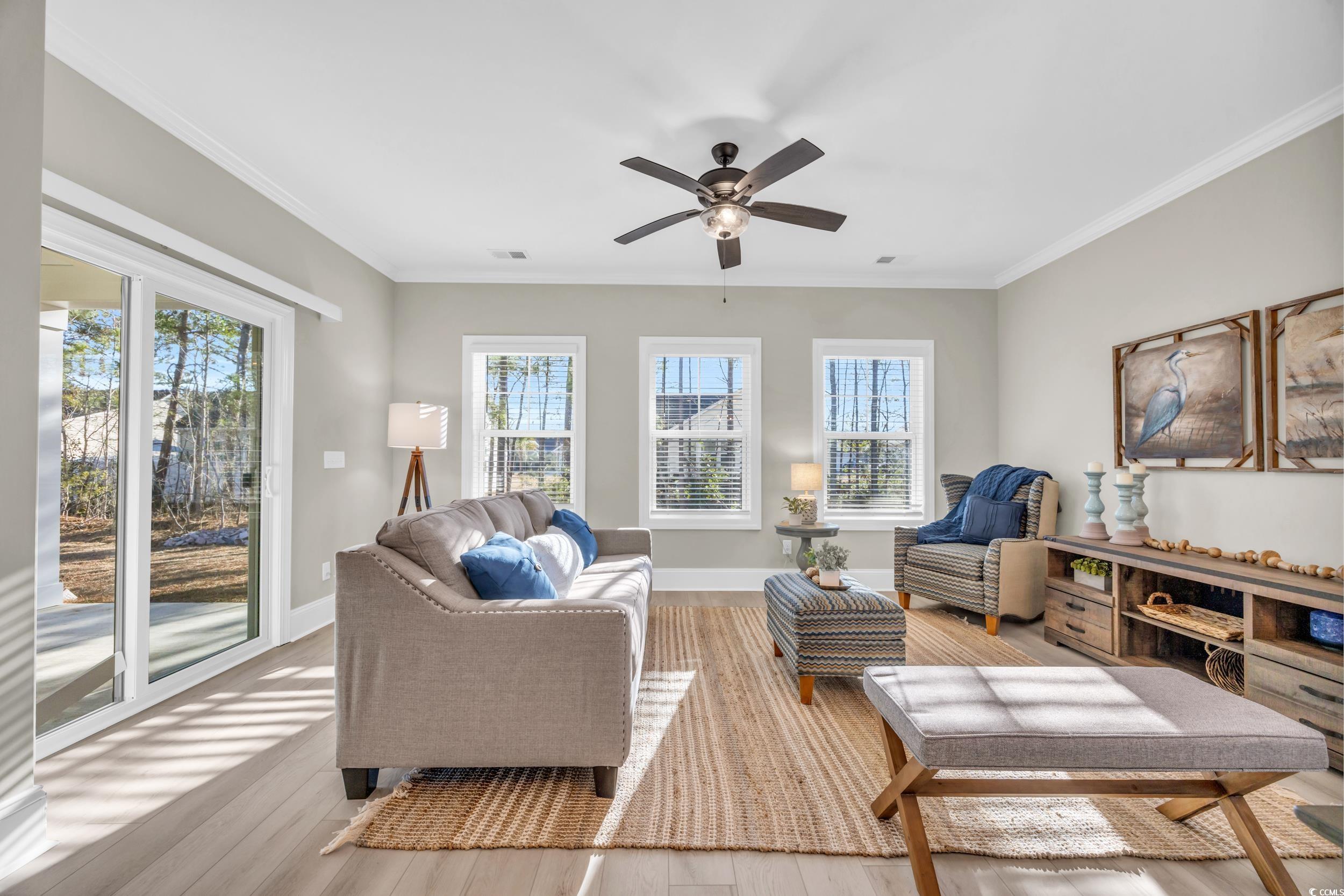 3123 Tiger Tail Road Conway, SC 29526 - Photo 21 of 38 Living room with ceiling fan, light hardwood / woo