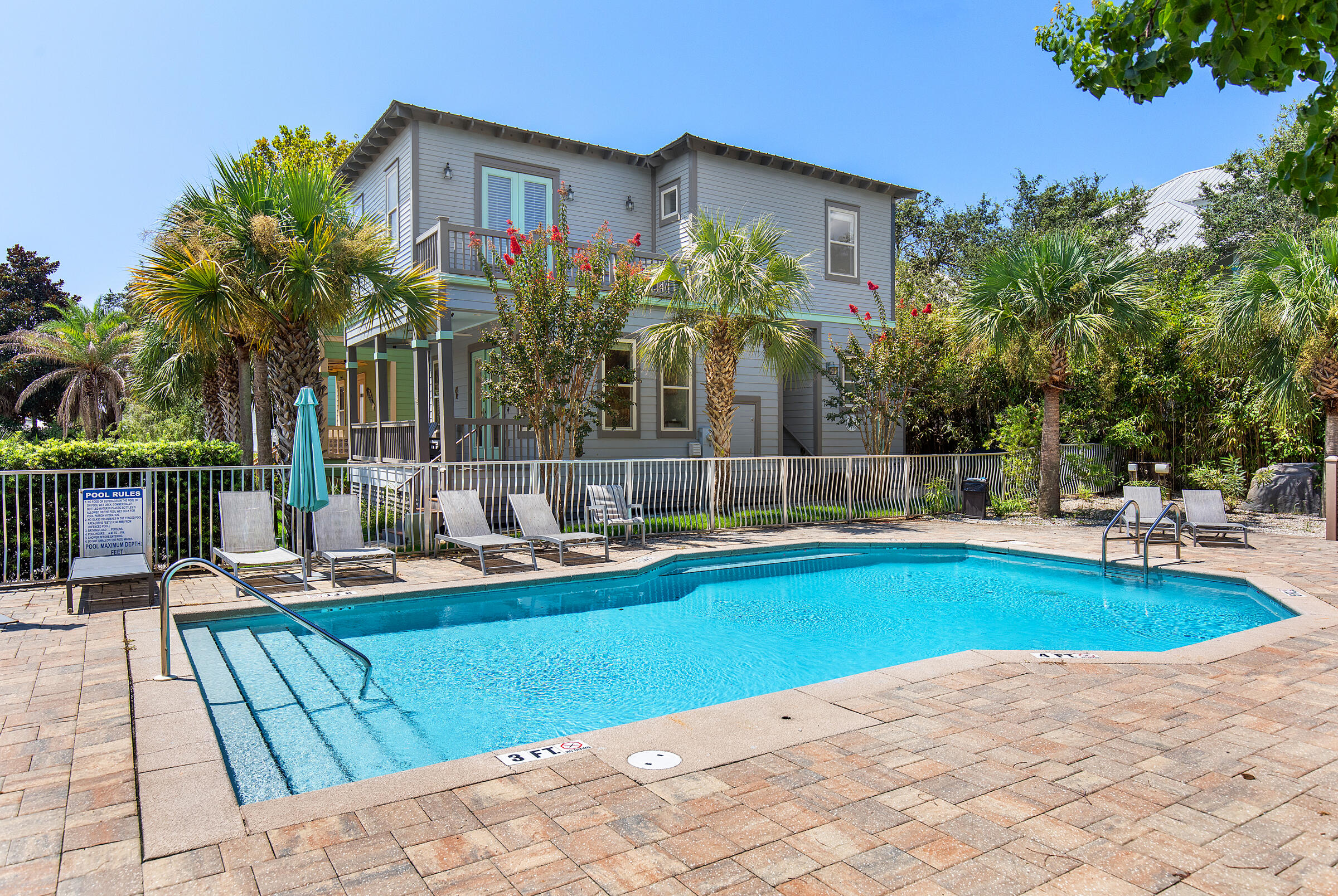 44 Asher Way Santa Rosa Beach, FL 32459 - Photo 12 of 63 a view of a swimming pool with a lounge chairs
