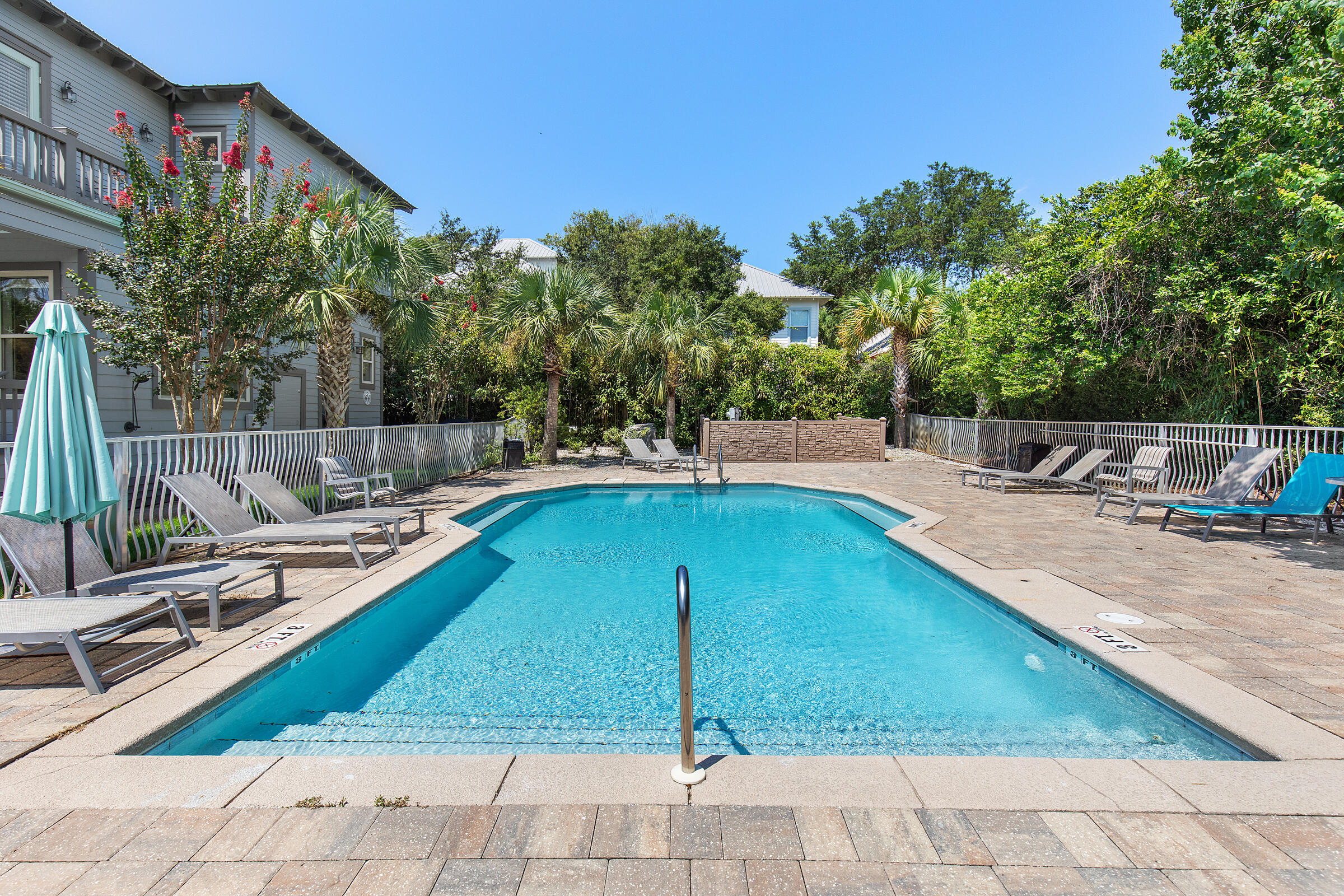 44 Asher Way Santa Rosa Beach, FL 32459 - Photo 13 of 63 a view of a swimming pool with a lounge chairs