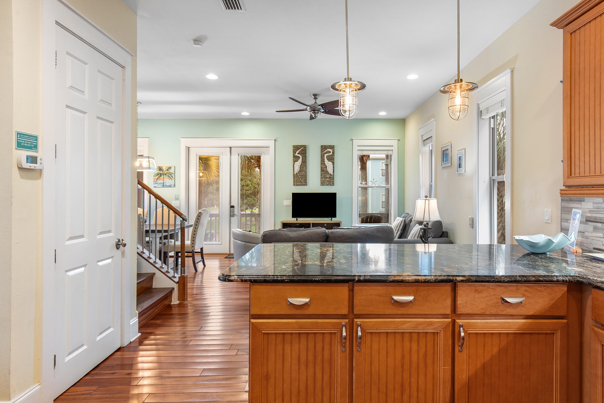 44 Asher Way Santa Rosa Beach, FL 32459 - Photo 23 of 63 a large kitchen with granite countertop a large island in the center and stainless steel appliances