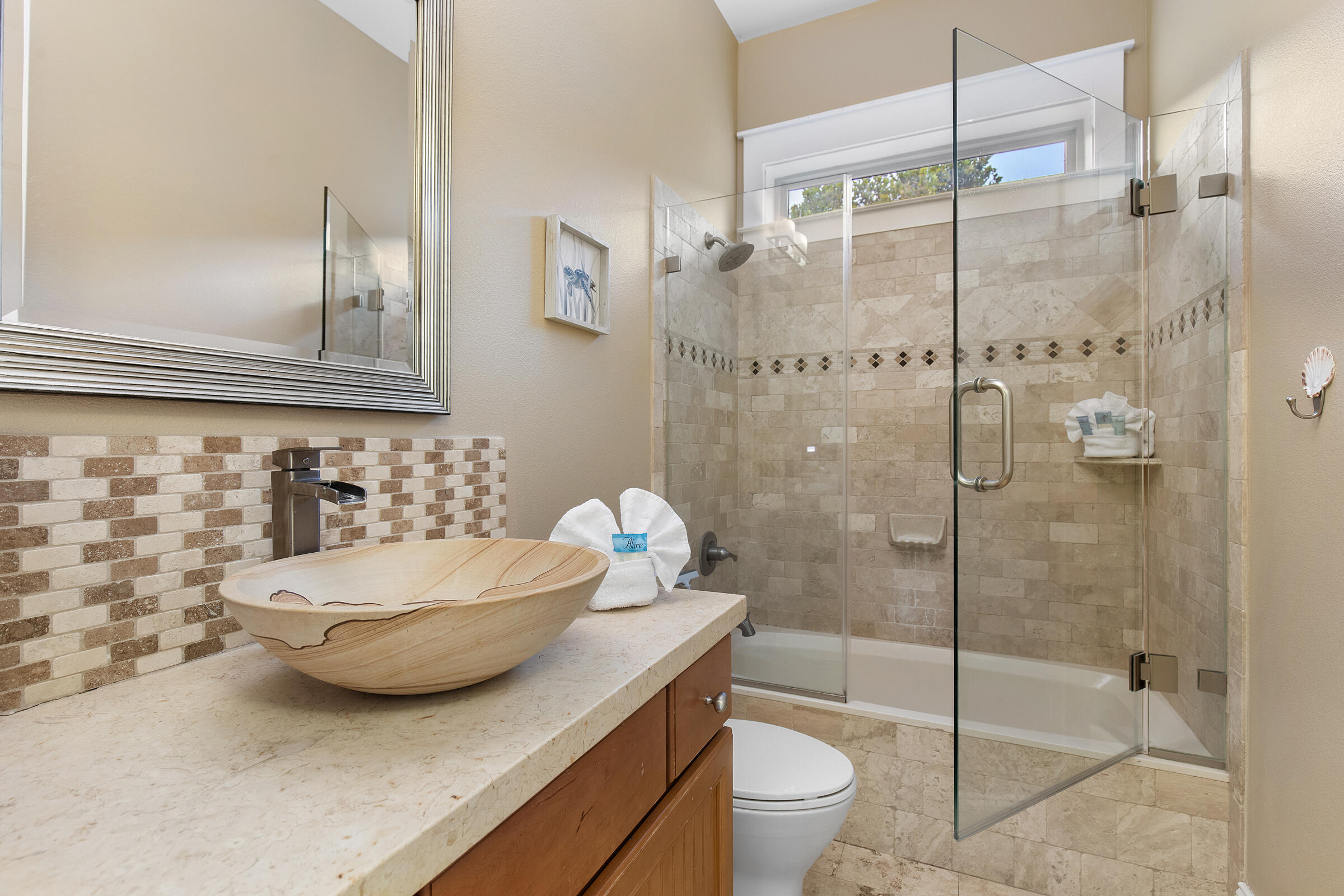 44 Asher Way Santa Rosa Beach, FL 32459 - Photo 29 of 63 a bathroom with a granite countertop sink a toilet and shower
