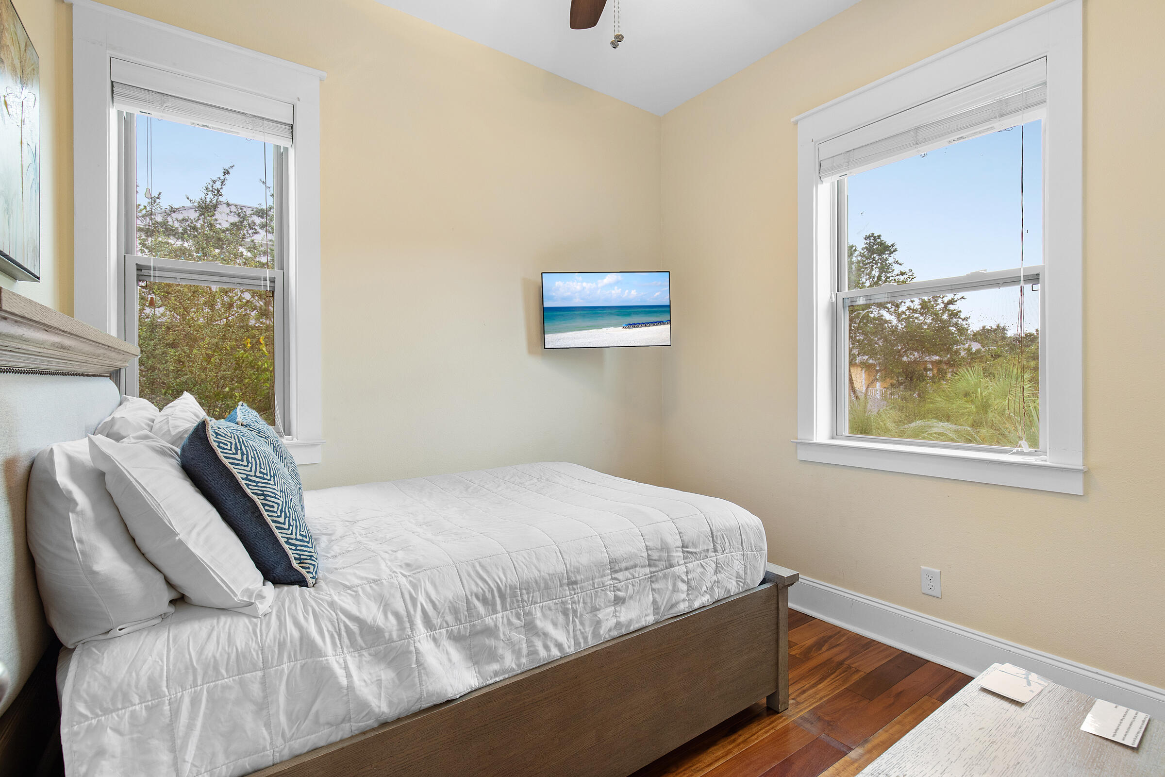 44 Asher Way Santa Rosa Beach, FL 32459 - Photo 31 of 63 a bedroom with a bed and wall painting with wooden floor