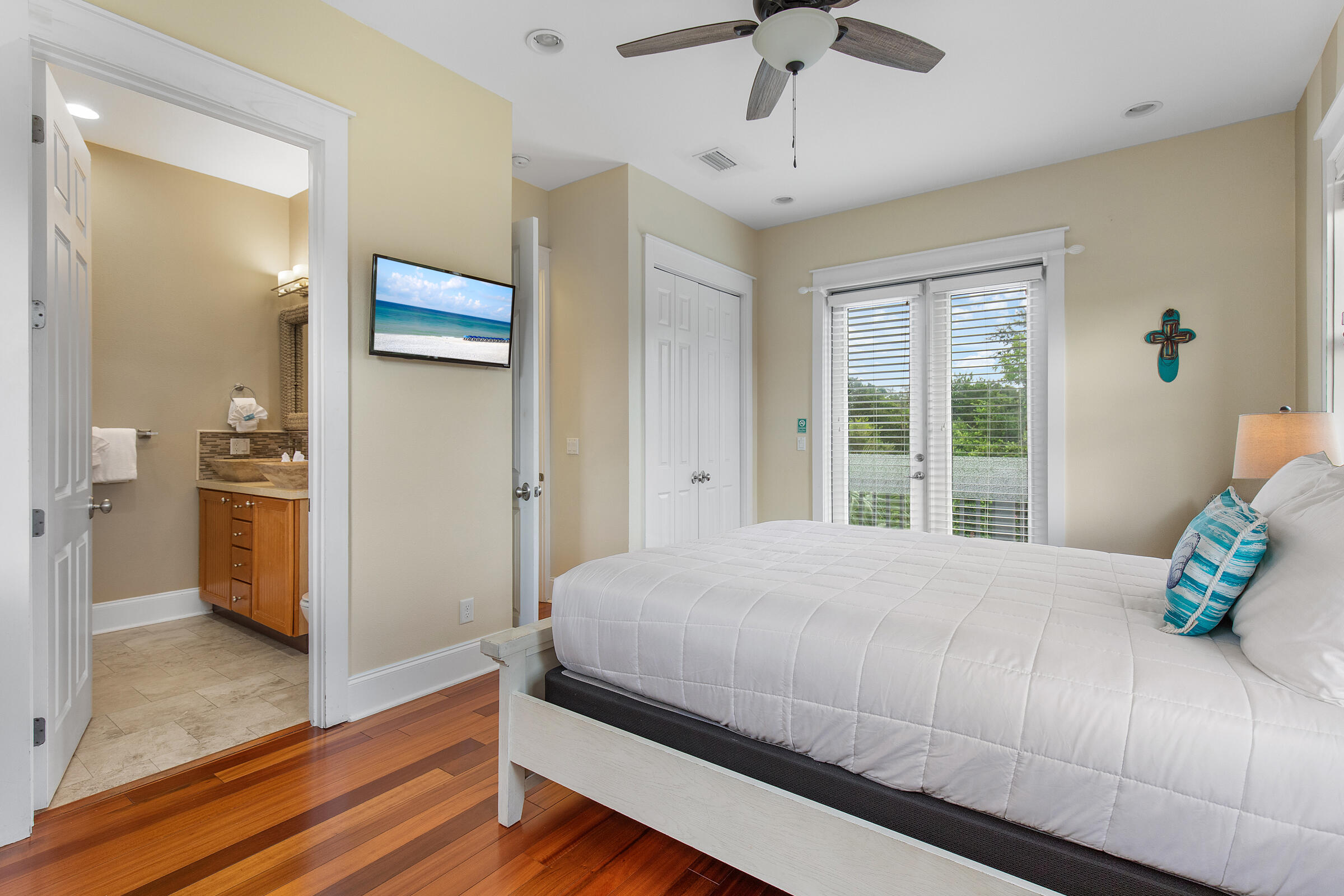 44 Asher Way Santa Rosa Beach, FL 32459 - Photo 39 of 63 a bedroom with a bed and a chandelier