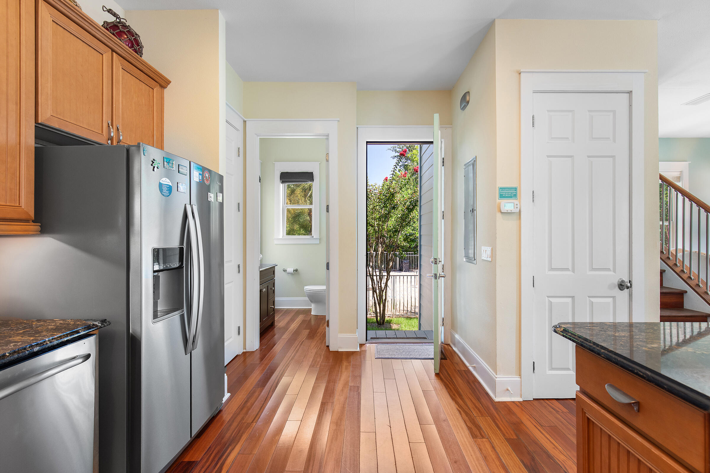 44 Asher Way Santa Rosa Beach, FL 32459 - Photo 51 of 63 a kitchen with stainless steel appliances granite countertop a refrigerator and a sink