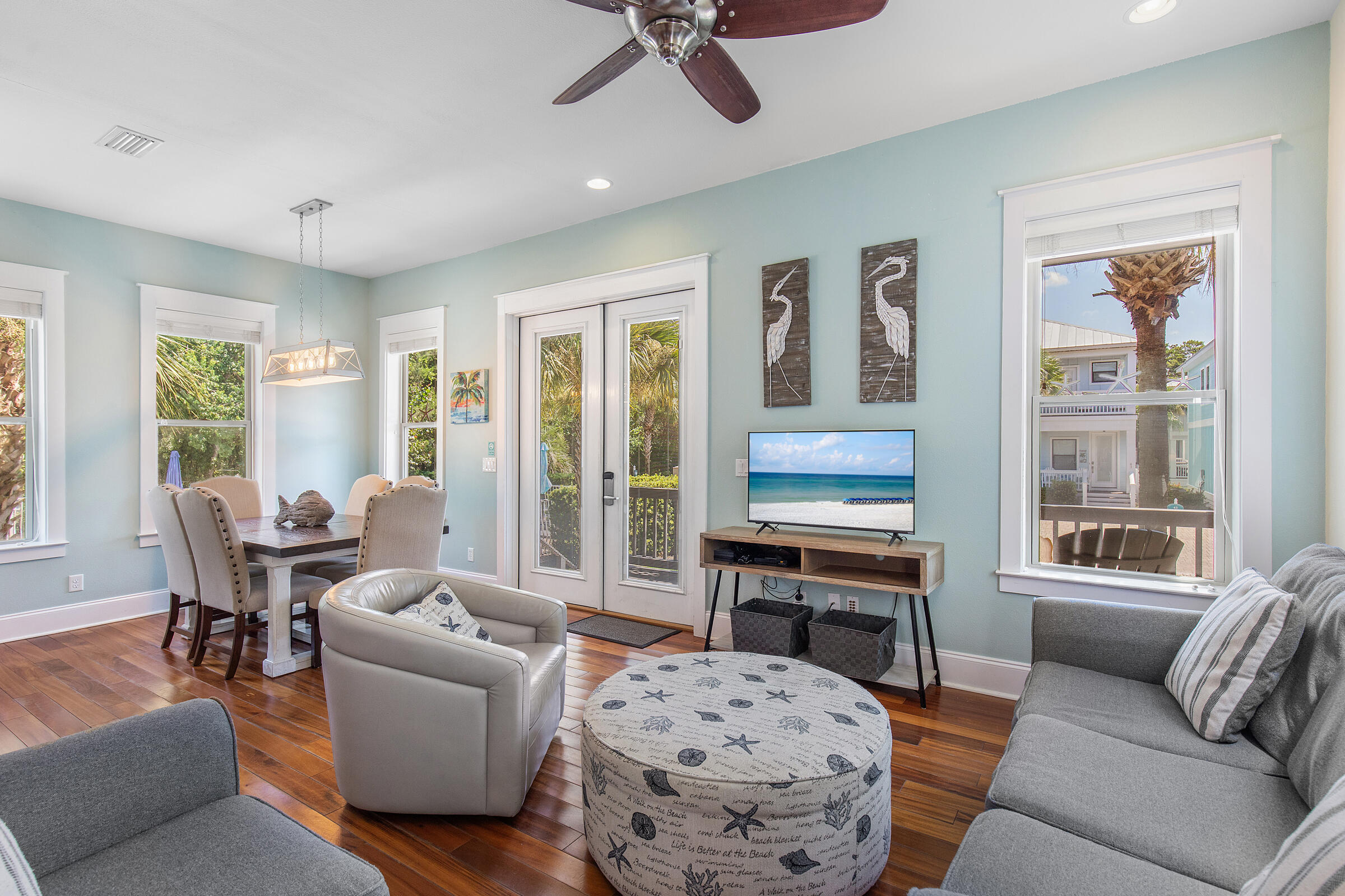 44 Asher Way Santa Rosa Beach, FL 32459 - Photo 60 of 63 a living room with furniture a large window and a table