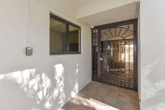 420 Celestial Way, Unit 101 Juno Beach, FL 33408 - Photo 11 of 37 a view of front door