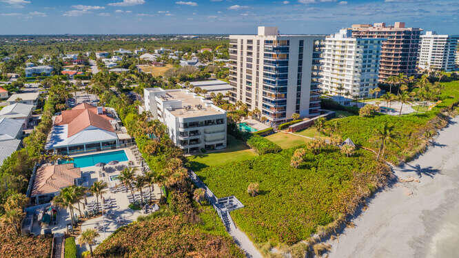 420 Celestial Way, Unit 101 Juno Beach, FL 33408 - Photo 36 of 37 an aerial view of a city with lots of residential buildings