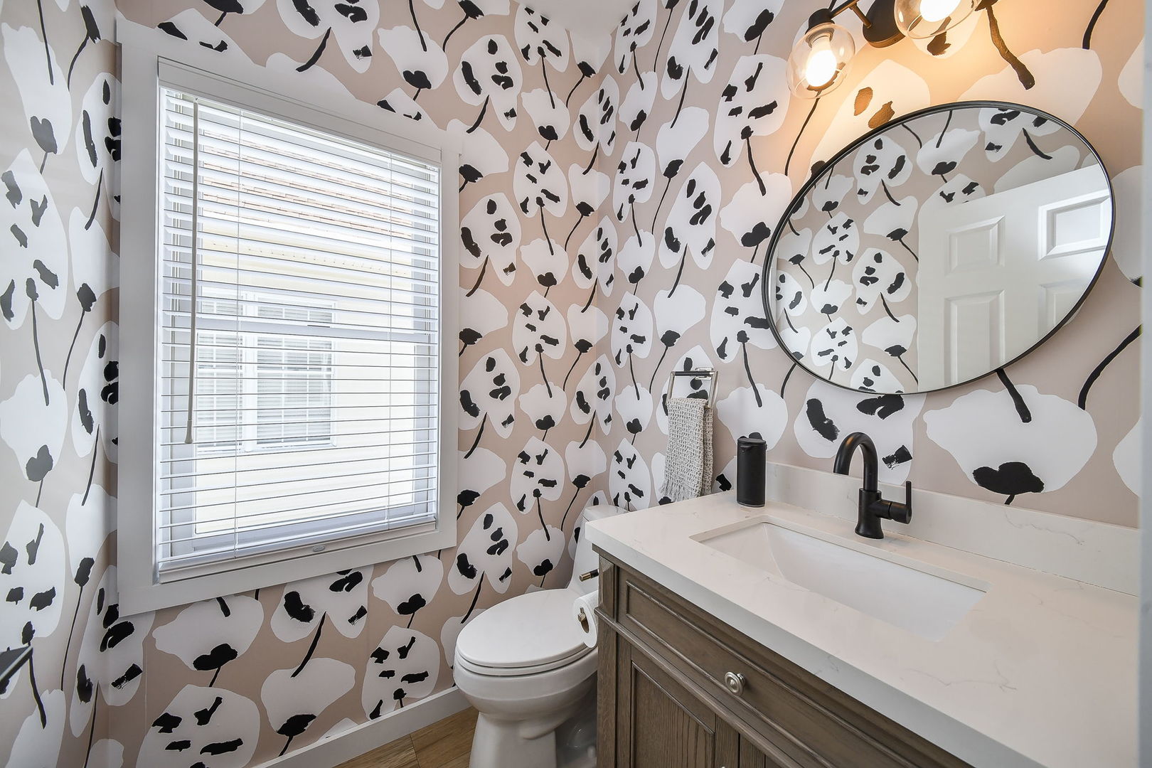 39W232 Armstrong Lane Geneva, IL 60134 - Photo 11 of 20 a bathroom with a sink a toilet and a mirror