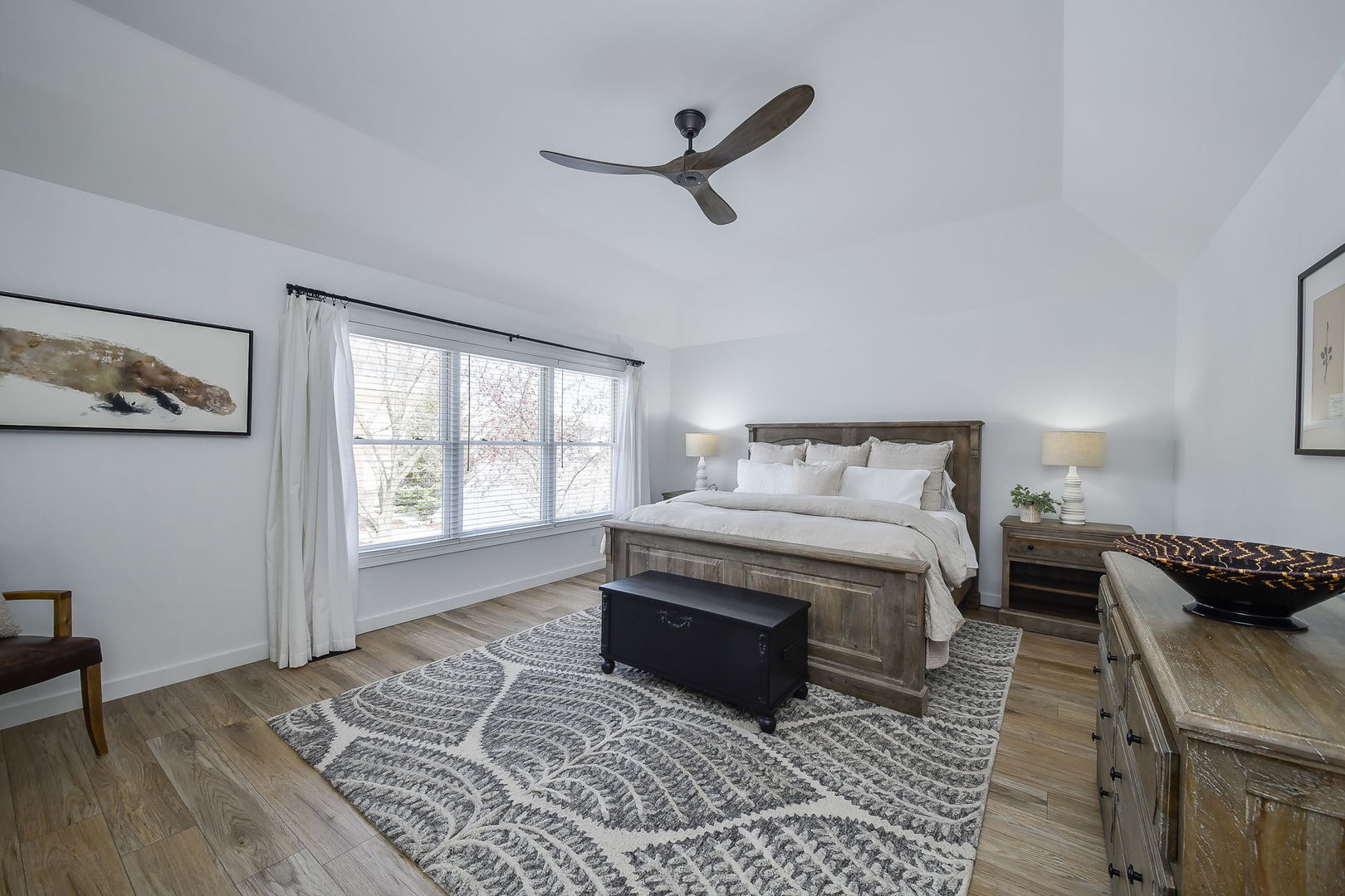 39W232 Armstrong Lane Geneva, IL 60134 - Photo 13 of 20 a bedroom with a bed and wooden floor