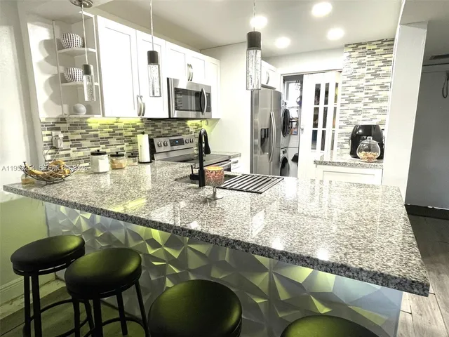 $180,000 | 7920 North Colony Circle, Unit 109, Tamarac, FL 33321