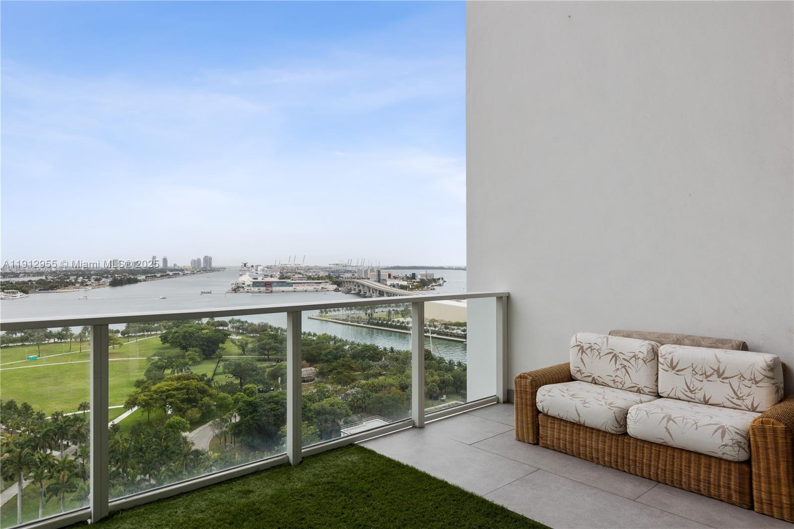 1040 Biscayne Boulevard, Unit 1602 Miami, FL 33132 - Photo 31 of 39 a living room with furniture