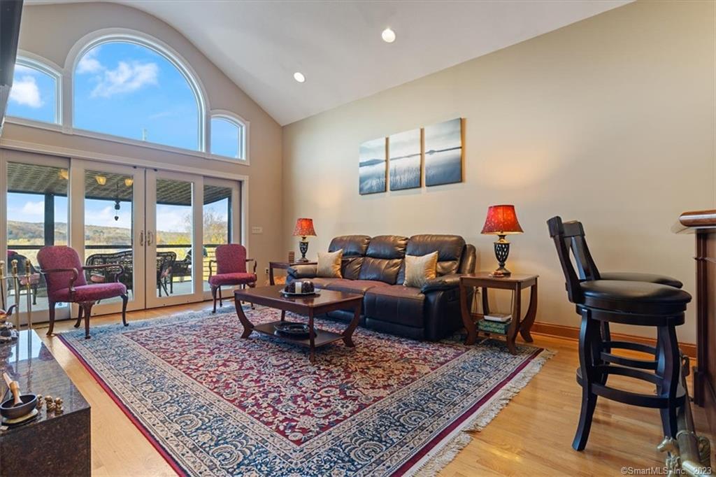 195 Injun Hollow Road Haddam, CT 06424 - Photo 11 of 40 a living room with furniture rug and window