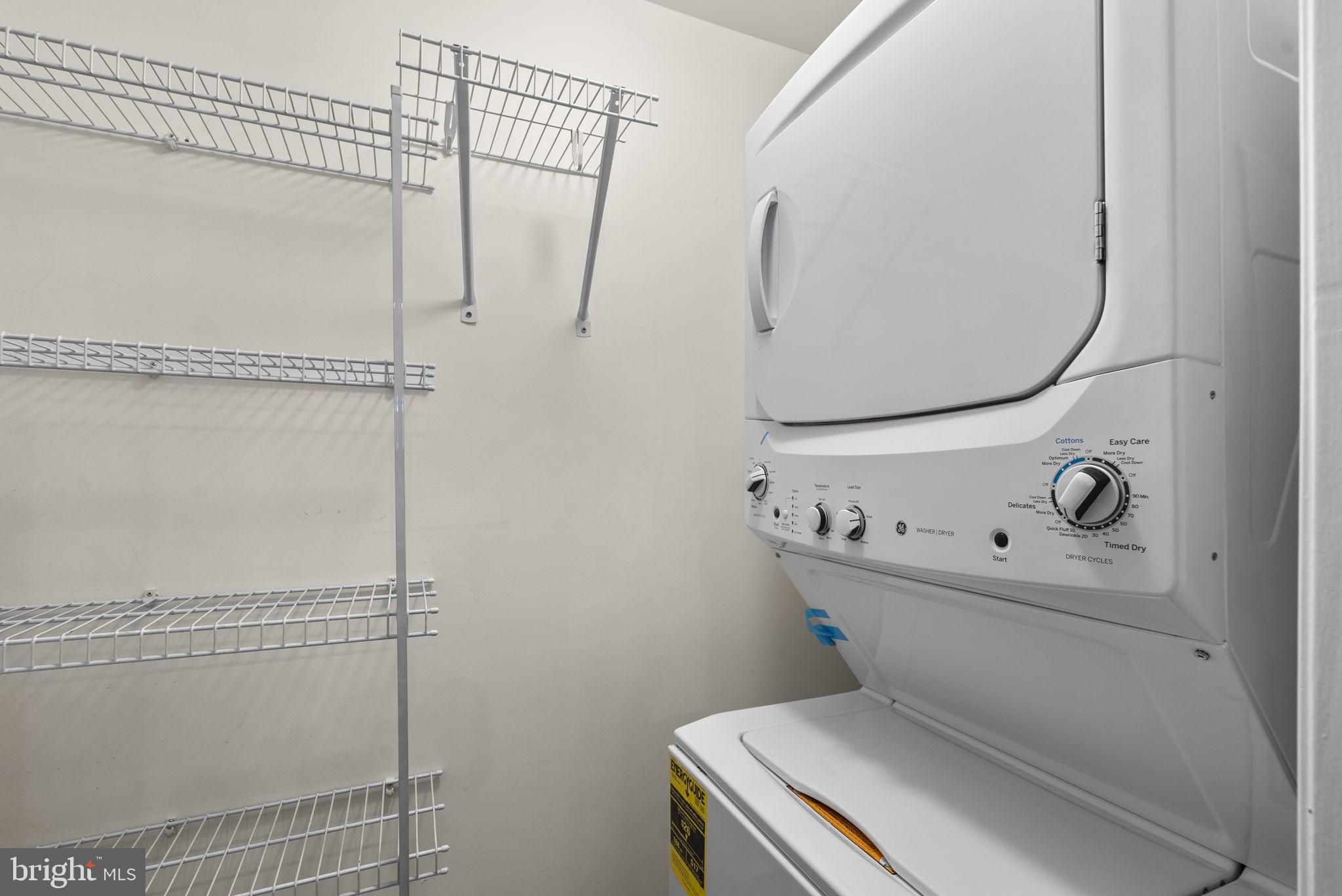 631 D Street Northwest, Unit 1129 Washington, DC 20004 - Photo 14 of 36 a utility room with dryer and washer