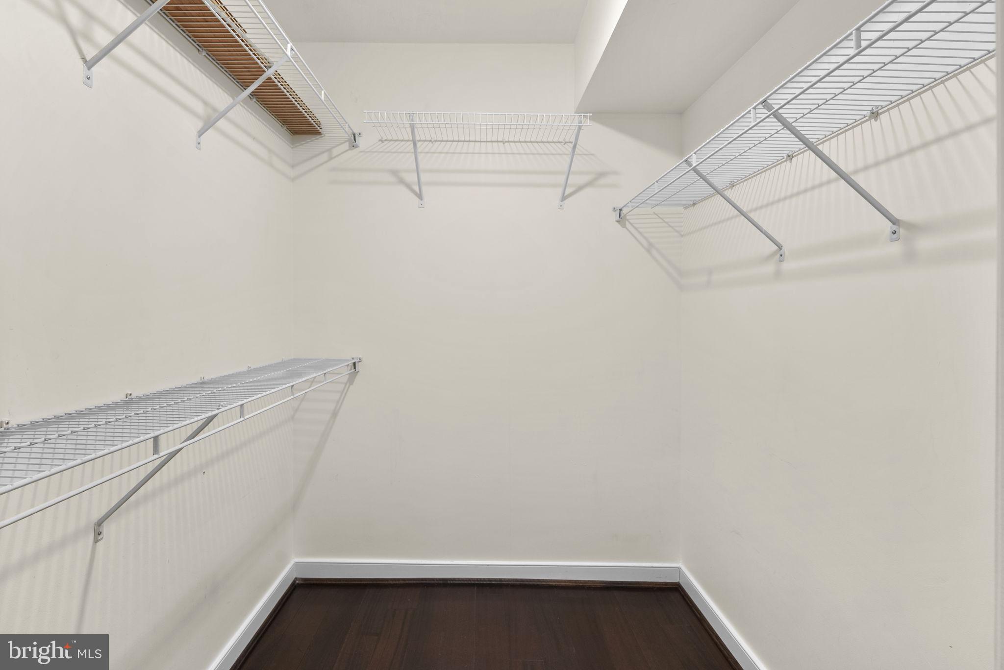631 D Street Northwest, Unit 1129 Washington, DC 20004 - Photo 20 of 36 a view of a room with racks on the wall