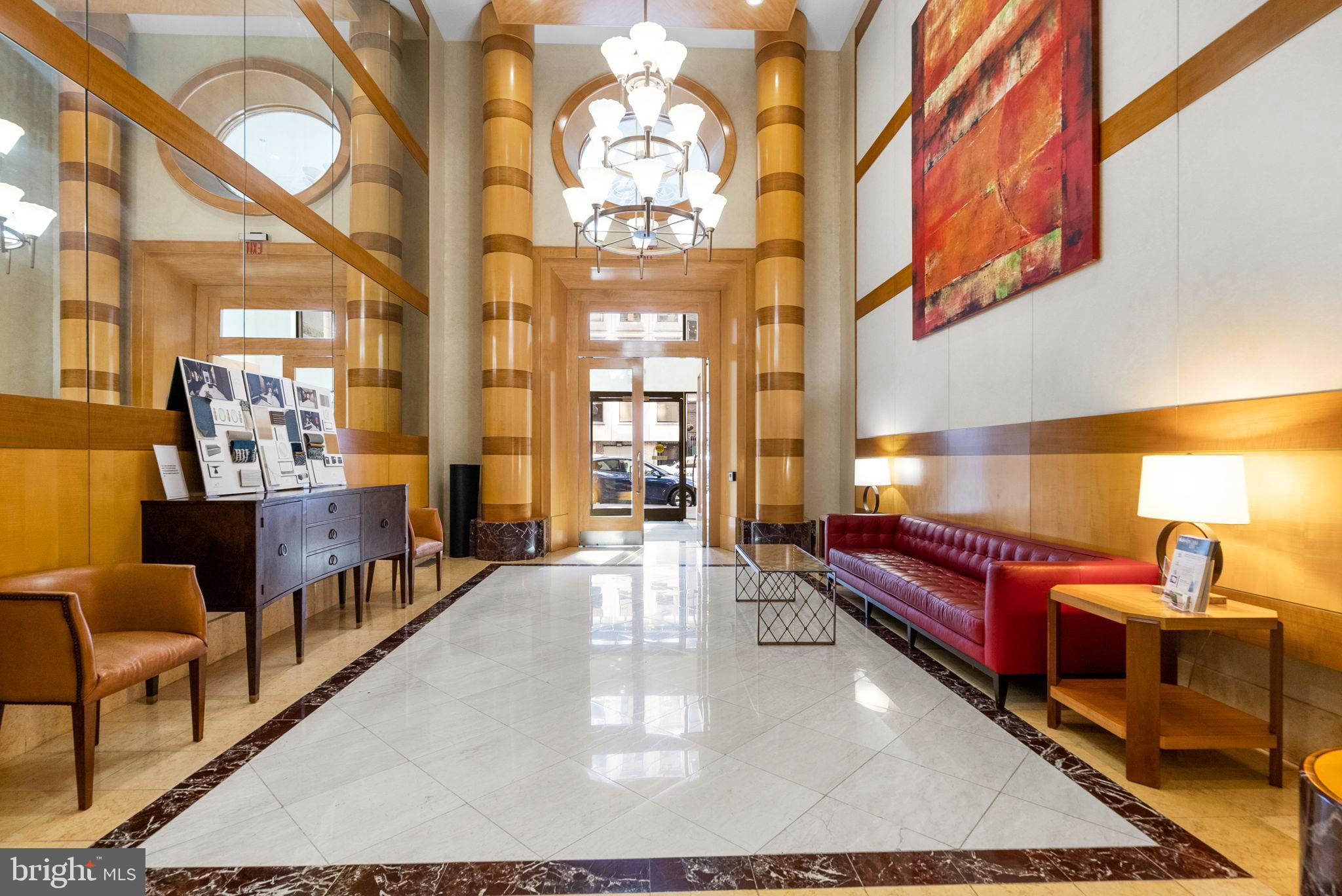 631 D Street Northwest, Unit 1129 Washington, DC 20004 - Photo 25 of 36 a lobby with furniture and chandelier
