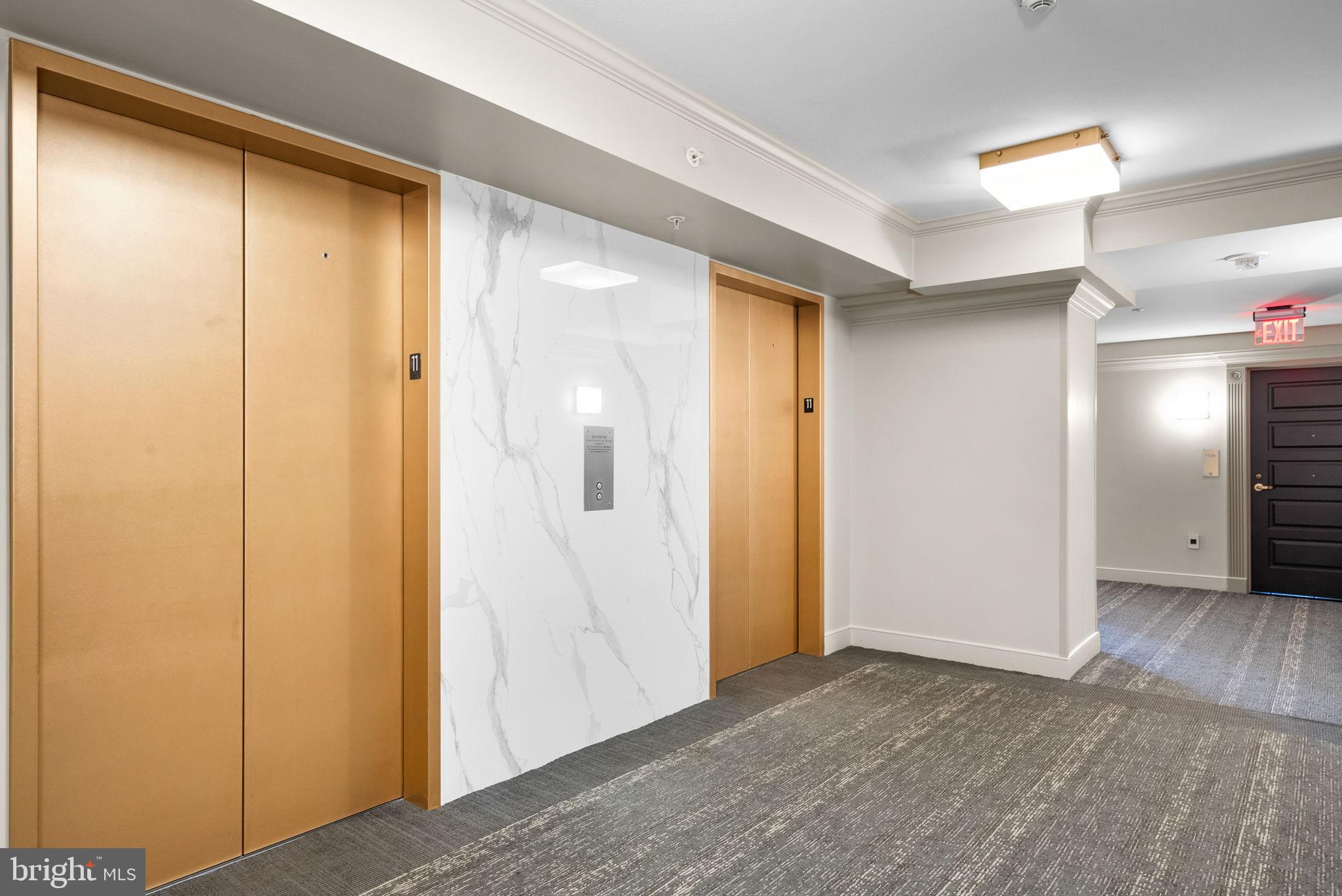 631 D Street Northwest, Unit 1129 Washington, DC 20004 - Photo 26 of 36 a view of hallway with wooden floor