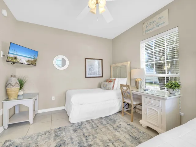 a kitchen with stainless steel appliances granite countertop a refrigerator a stove top oven a sink and dishwasher