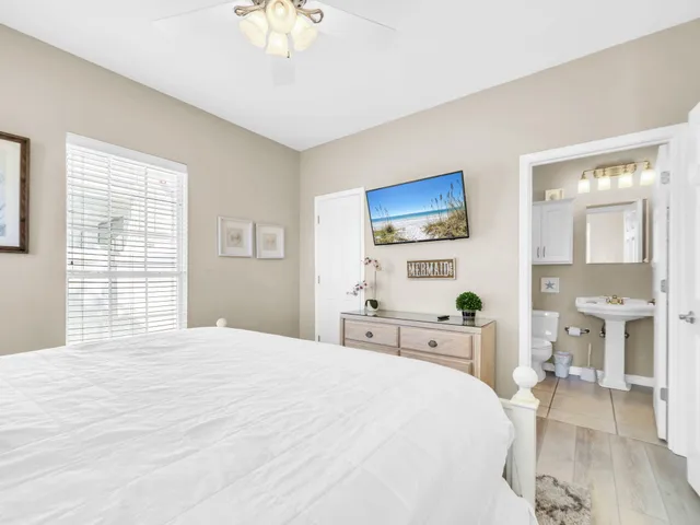 a kitchen with granite countertop a sink and cabinets