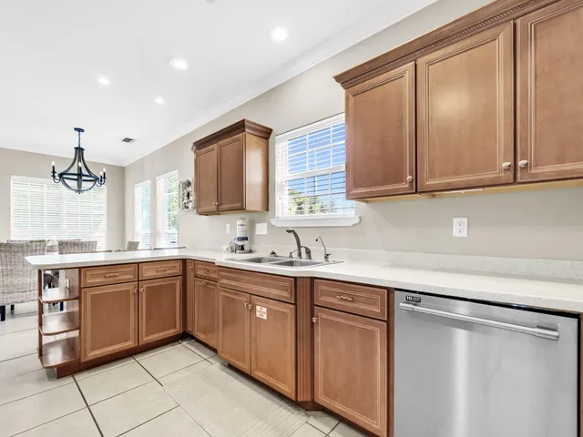 an aerial view of a house with yard swimming pool and outdoor seating