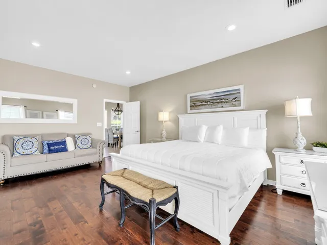 an aerial view of a residential apartment building with a yard and plants