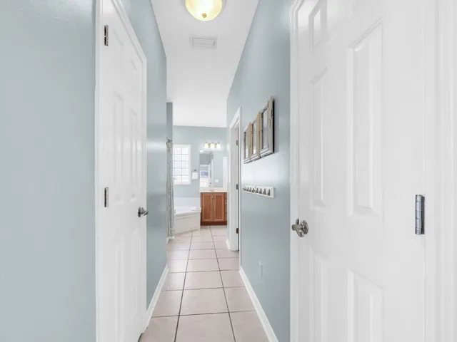 an aerial view of residential building and trees